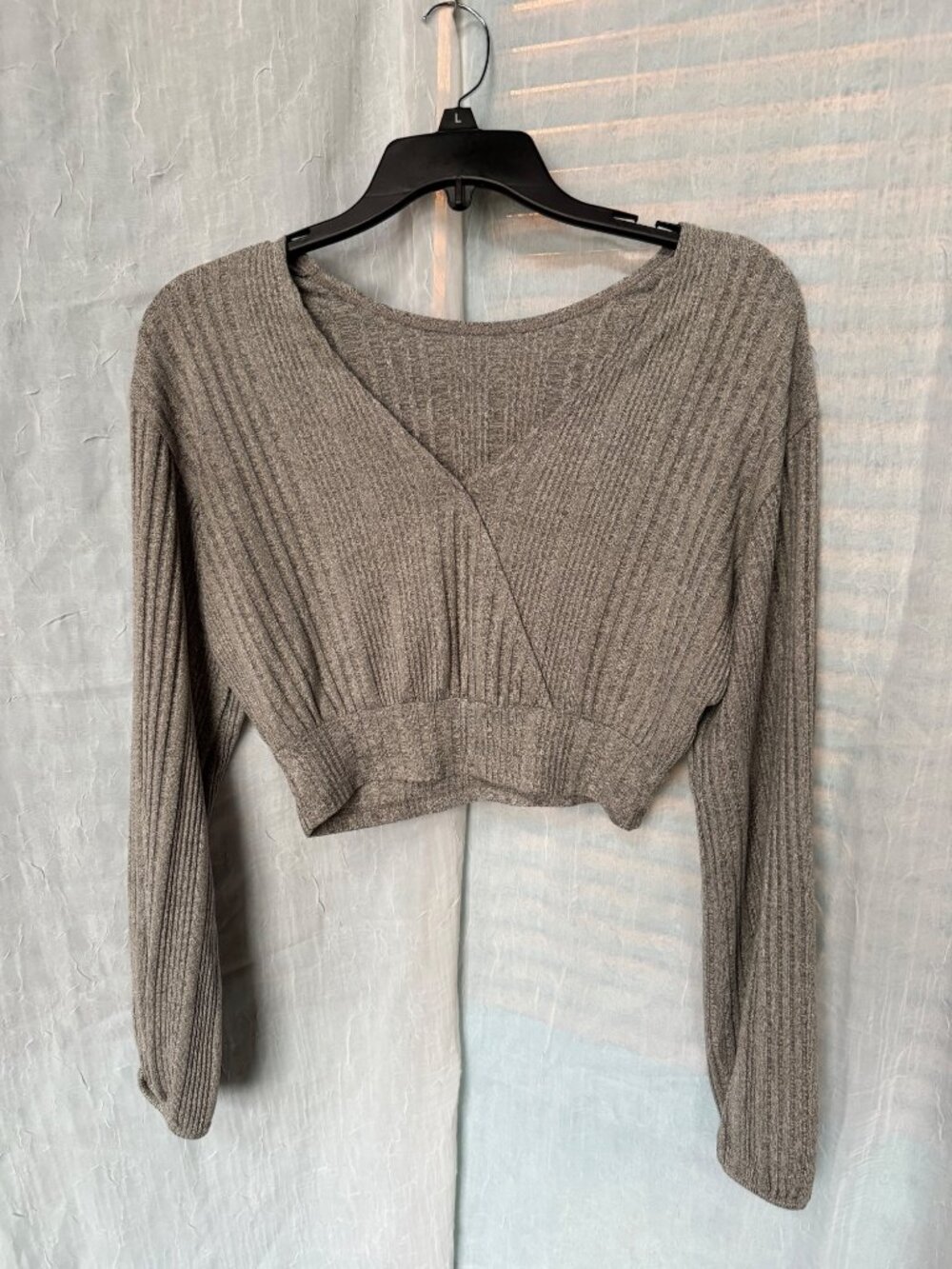 Hollister Co. ribbed crop top, featuring a v-neck wrap style and long sleeves
